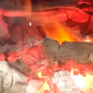 בעירה שנייה בקמין עץ לחימום יעיל